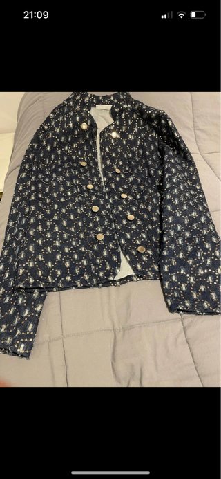 Chaqueta azul y dorada