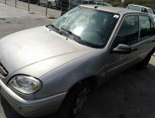 1468754 9636331780 faro izquierdo citroen saxo 1.5