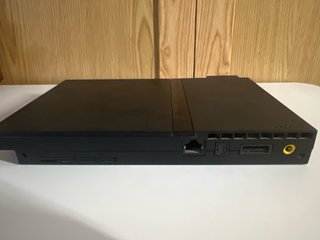 PS2 Slim Negra con mando y memory card.