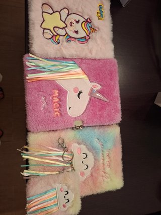 Libretas de pelo con unicornios y nubes