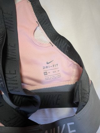 Top sujetador deportivo Nike rosa y gris