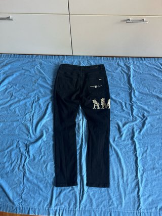 Jeans Amiri Neri Strappati