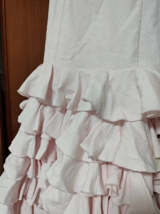 Traje de flamenca rosa volantes