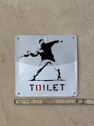 Insegna Toilet Banksy Style