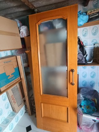 Puerta de madera con cristal corredera