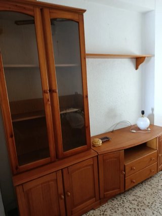 Mueble de salón madera y cristal