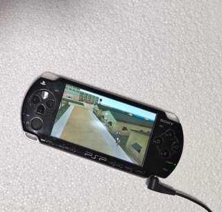Consola PSP slim Negra + juegos UMD