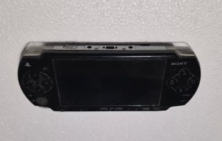 Consola PSP slim Negra + juegos UMD