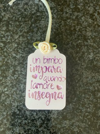 Targhetta gesso ceramico Un bimbo impara...