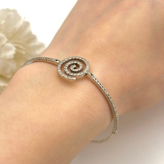 Pulsera oro 18kt espiral con diamantes