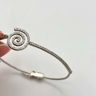 Pulsera oro 18kt espiral con diamantes