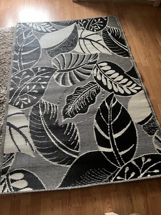 Alfombra de con estampado de hojas