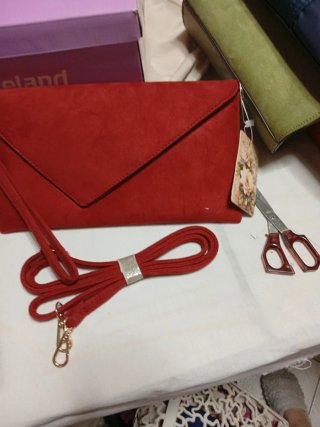 Bolso de mano y con asa larga para colgar
