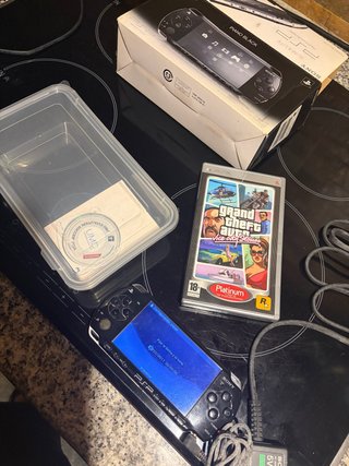 PSP Negra Slim & Lite + 2 Juegos