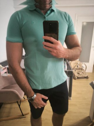 Polo Calvin Klein turquesa. Diseño clasico.