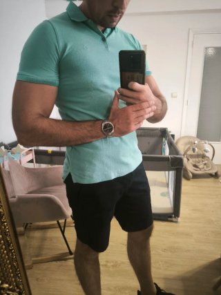 Polo Calvin Klein turquesa. Diseño clasico.
