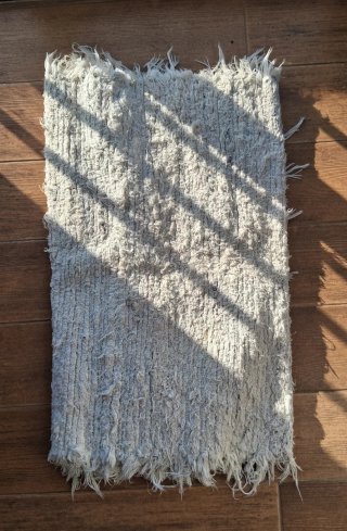 Alfombra de tela y yute beige