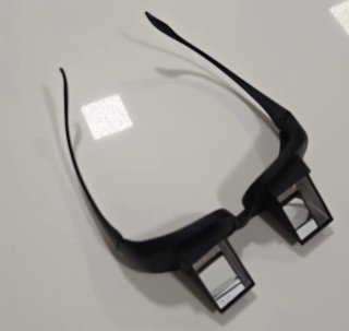 Gafas prismáticas para leer tumbado