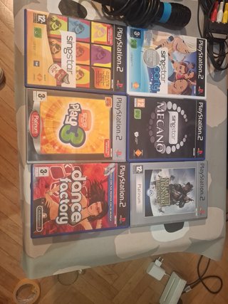 Pack Ps2 Slim juego en familia.