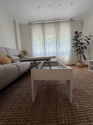 Mesa centro elevable blanca con almacenaje