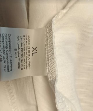 Blusa blanca con encaje y espalda abierta