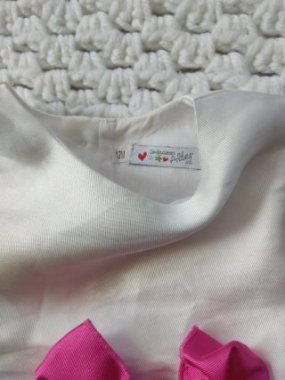 Vestido bebé floral con lazo rosa
