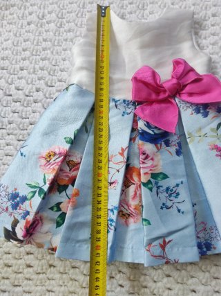 Vestido bebé floral con lazo rosa