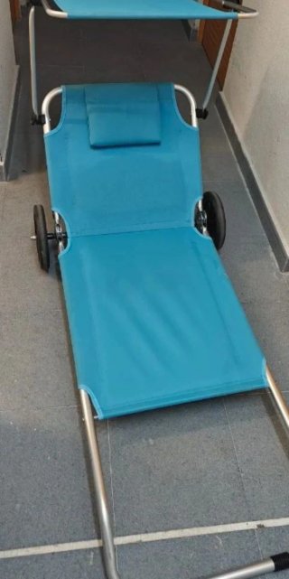 Silla de playa con capota y ruedas