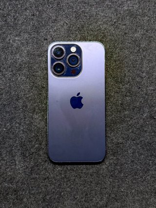 iPhone 14 Pro 128GB Morado · Sin caja · Batería 74