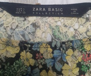 Vestido Zara floral cut-out talla L