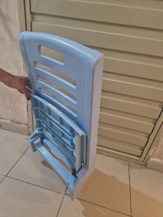 Silla de plástico para playa