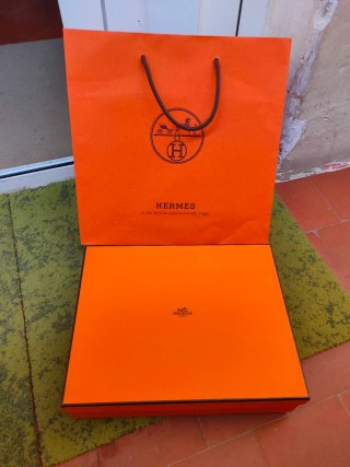Bolsa y caja Hermes naranja