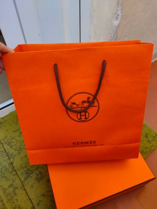 Bolsa y caja Hermes naranja
