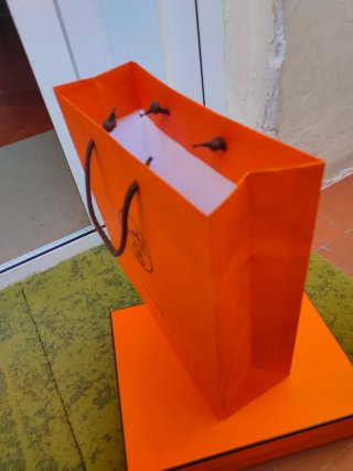 Bolsa y caja Hermes naranja