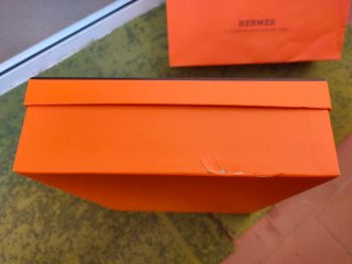 Bolsa y caja Hermes naranja