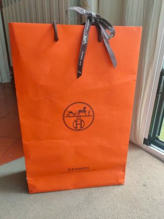 Bolsa y caja Hermes naranja