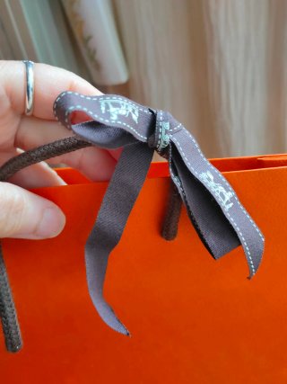 Bolsa y caja Hermes naranja