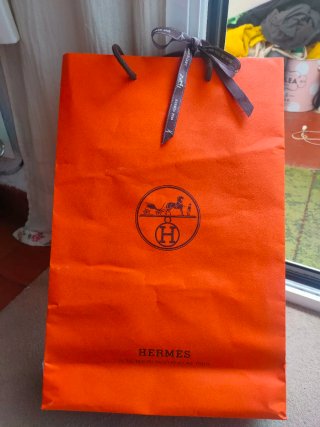 Bolsa y caja Hermes naranja