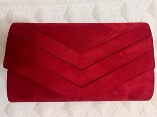 Bolso de mano tipo cartera rojo