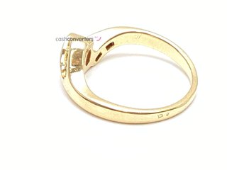 anillo oro 18k con piedra con diamante