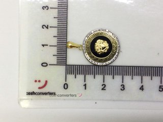 medalla oro 18k con piedra con circonita,onix