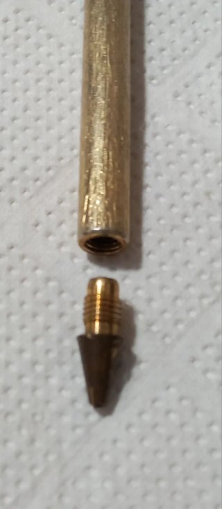 Bolígrafo BIC antiguo con piedra roja