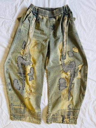 Pantalones vaqueros anchos desgastados para hombre
