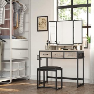Tavolo da Trucco con Specchio Pieghevole in 3 Pezzi, Supporto per Asciugacapelli, Tavolo Cosmetico con Sgabello Imbottito, 3 Cassetti, Design Industriale, Greige e Nero RVT004B02