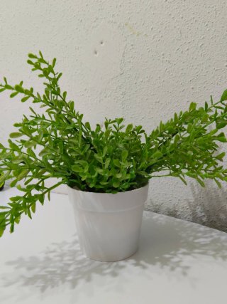 Planta artificial decorativa verde
