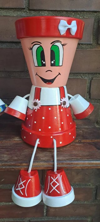 Figure di fioriere in ceramica (4 unità)