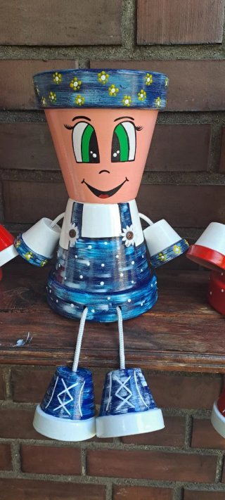 Figure di fioriere in ceramica (4 unità)