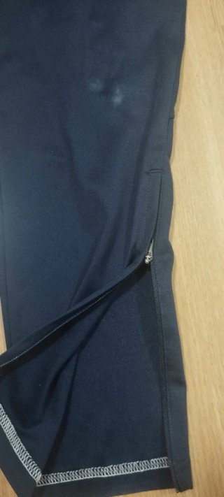 Pantalón Nike Azul con Raya Blanca