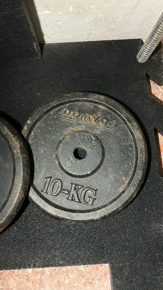 2 discos de pesa 10kg Hierro + Barra 160