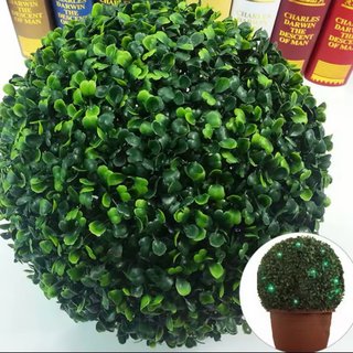 Planta artificial redonda en maceta gris